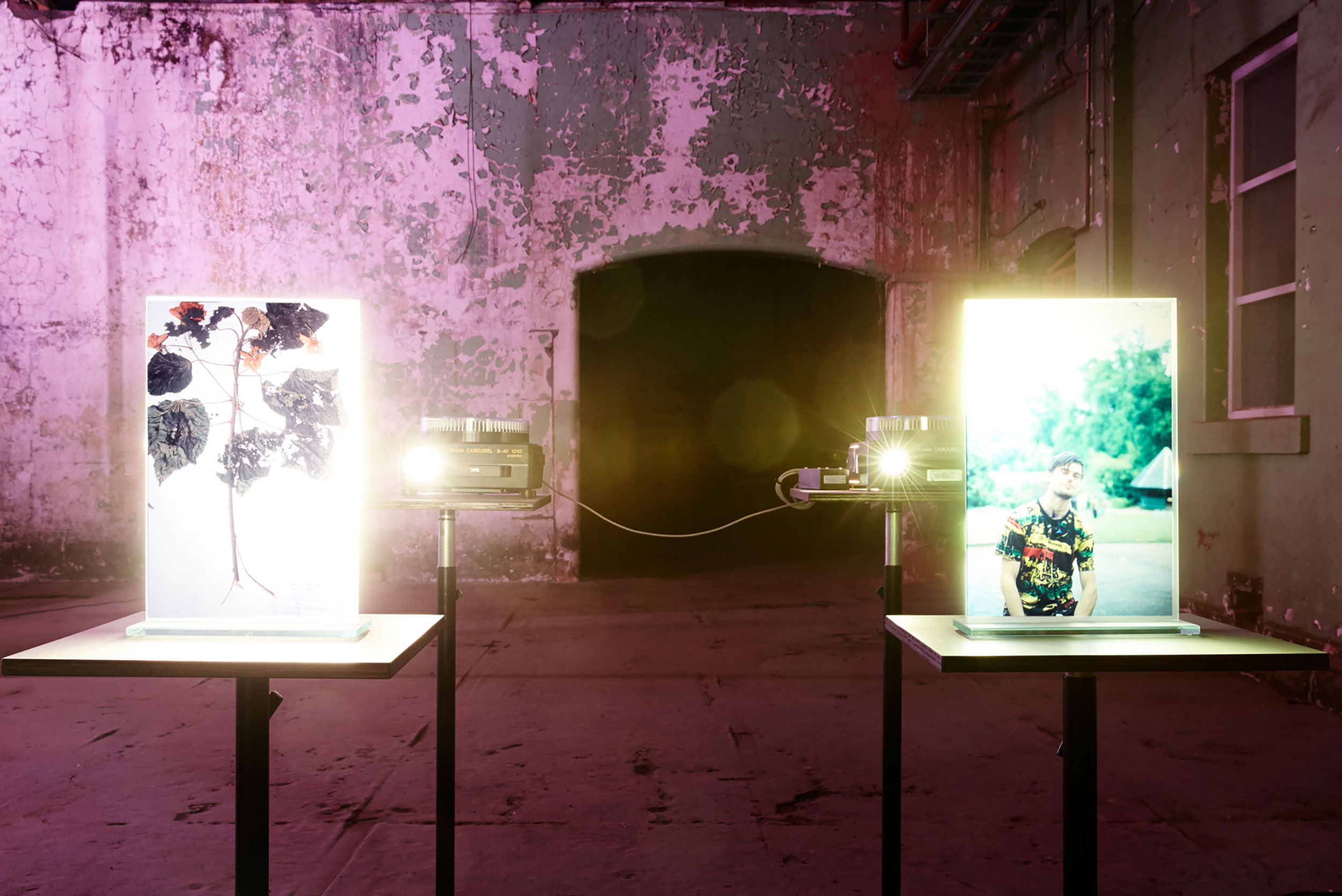 Two illuminated slide projections facing each other in the Magdalen Laundries