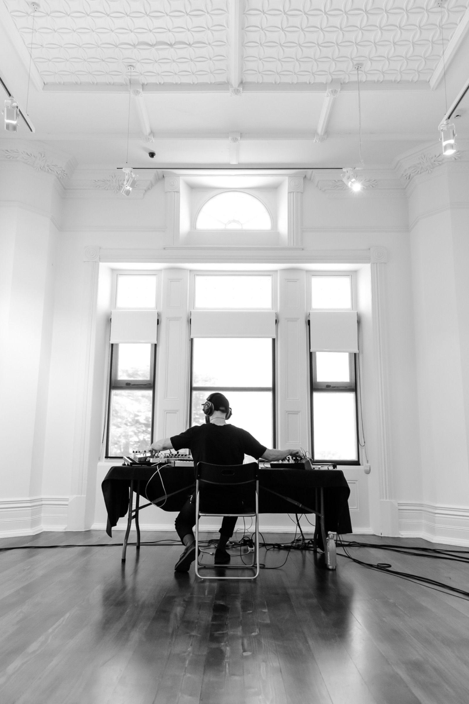 Tilman Robinson recording at a table in Bundoora Homestead