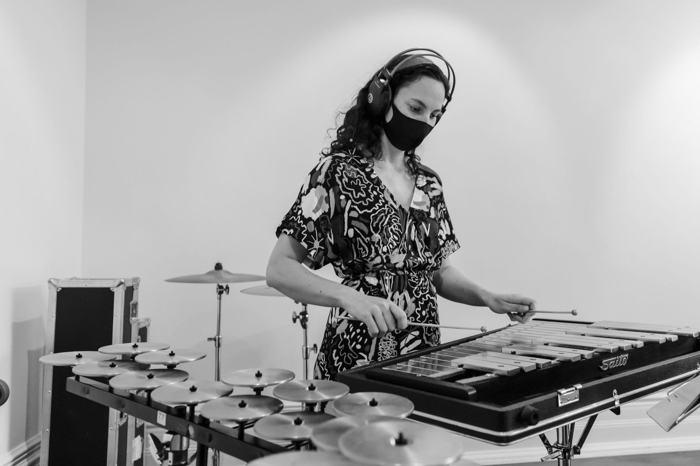 Kaylie Melville recording with percussion instruments at Bundoora Homestead