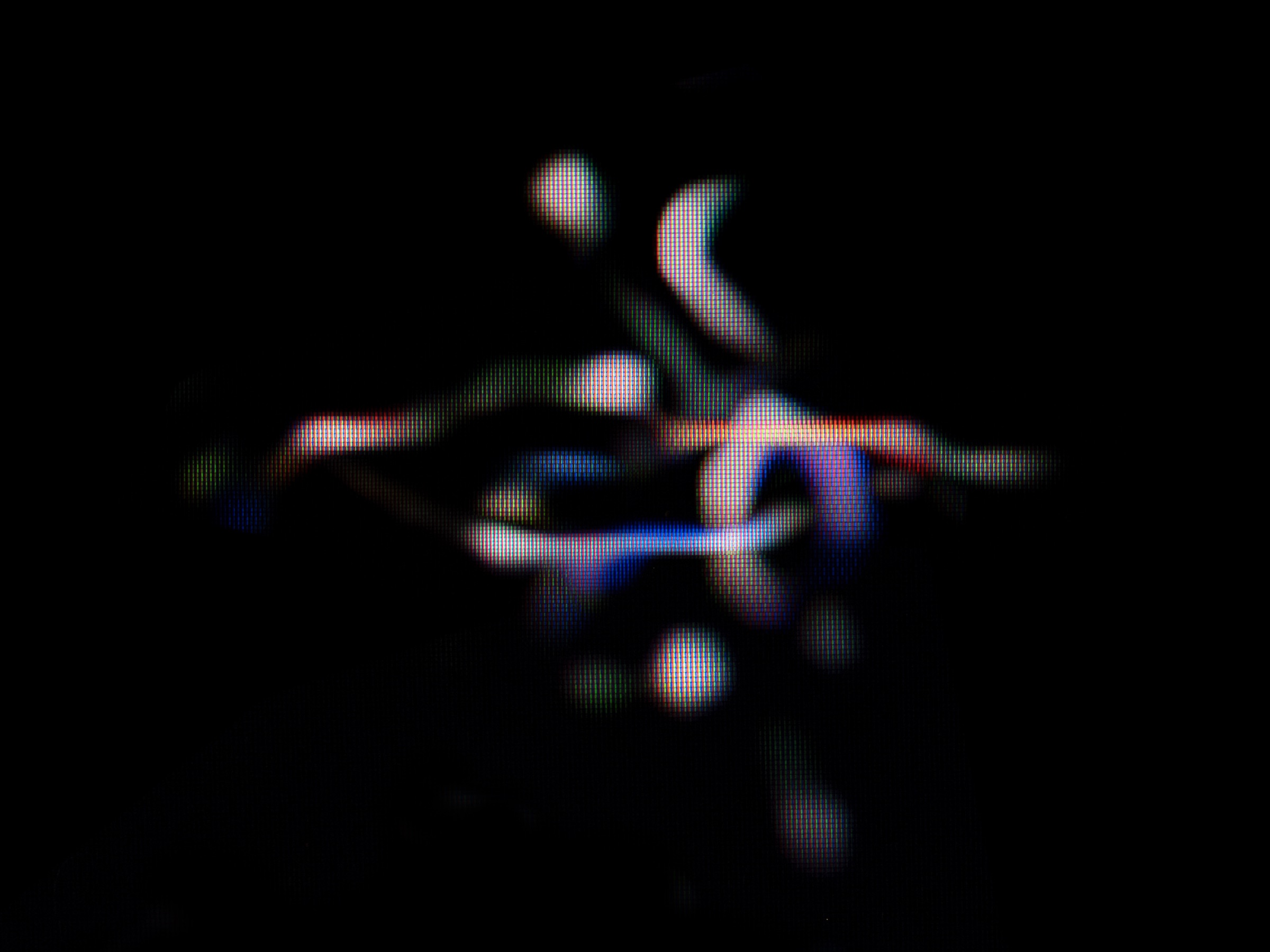 Conglomerated muon particle traces forming an abstract luminous image