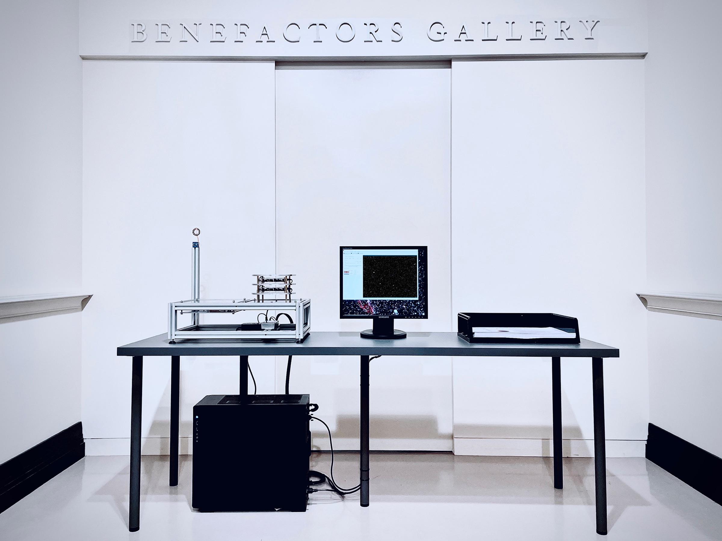 Wide installation view of the μMuography cosmic printer at Castlemaine Art Museum