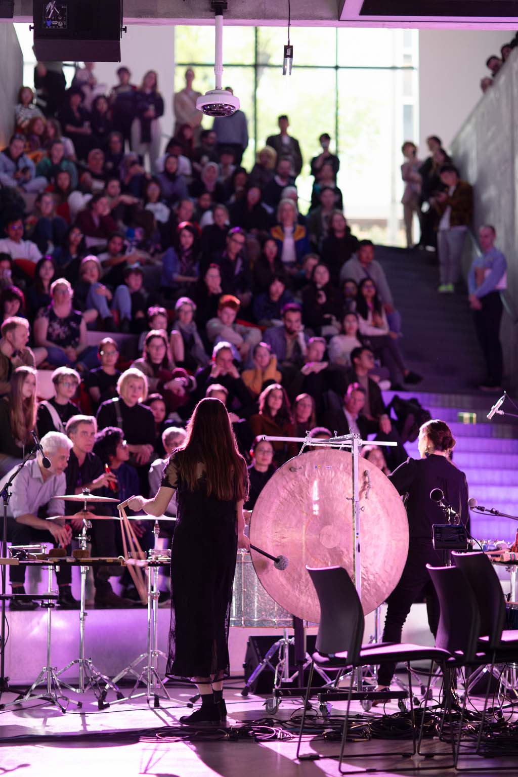 Wide view of the μMuography live performance and audience at Science Gallery Melbourne