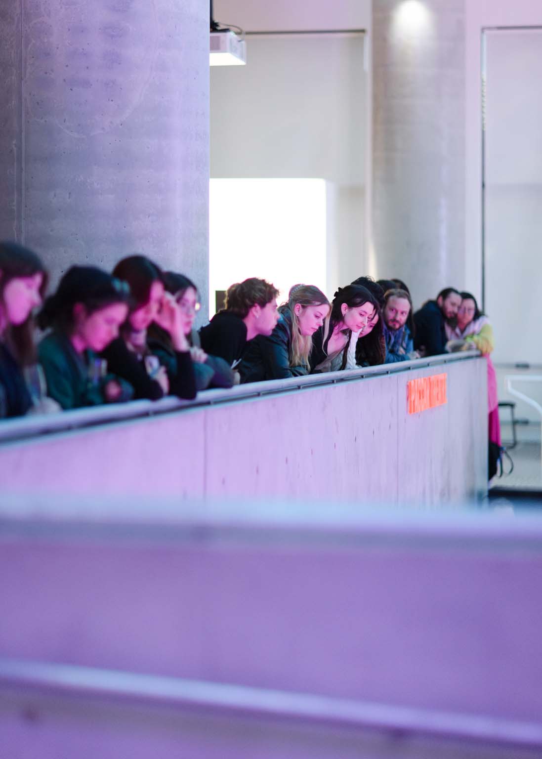Audience members listening from the upper level of Science Gallery Melbourne
