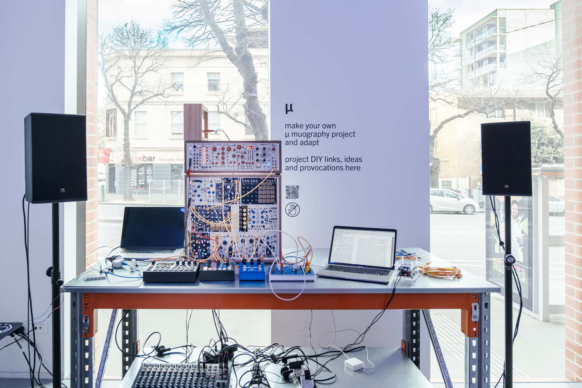 Modular synthesiser, speakers and computers arranged for the live sound laboratory