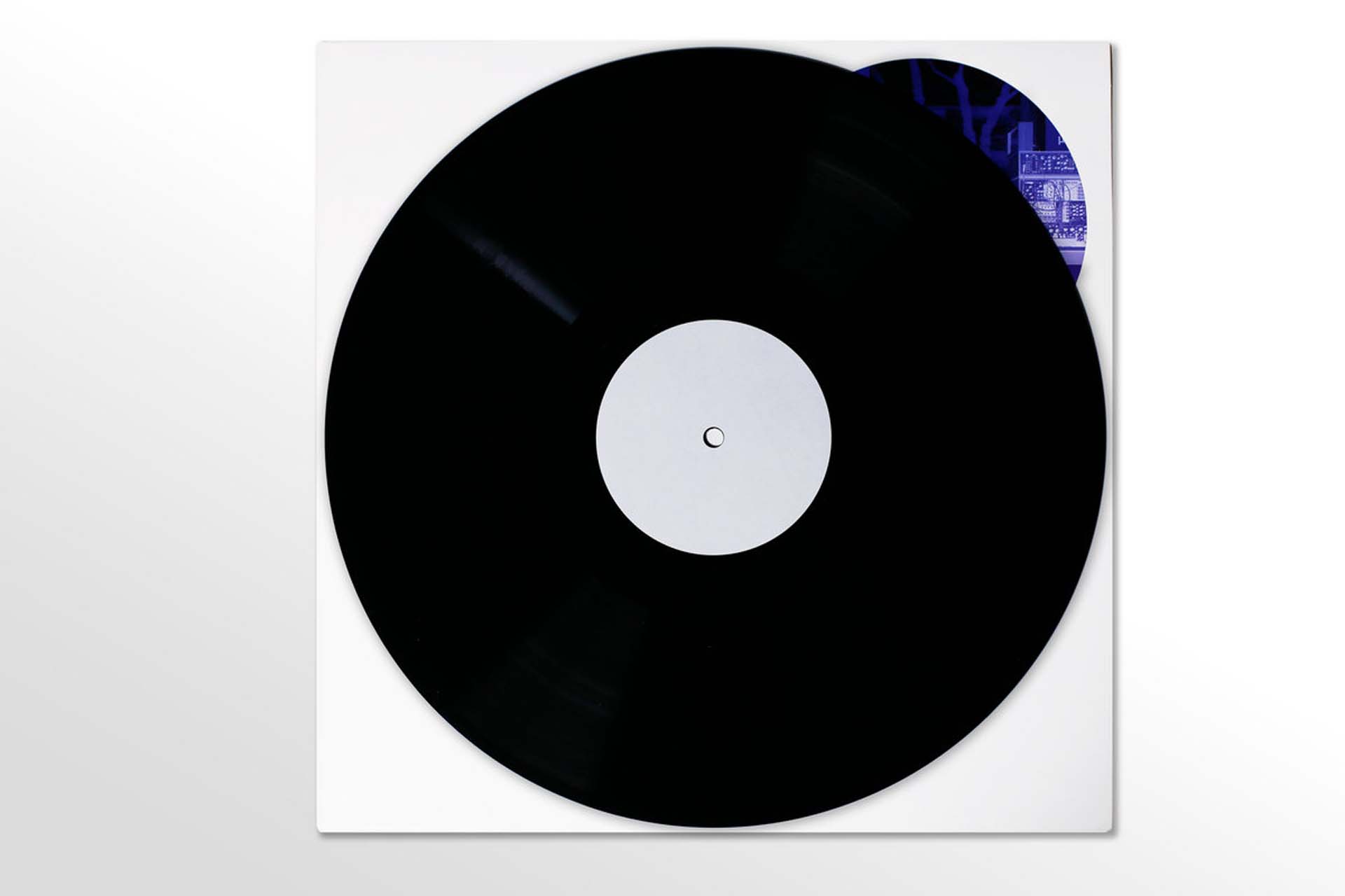 Black lathe-cut μMuography vinyl record in a white sleeve