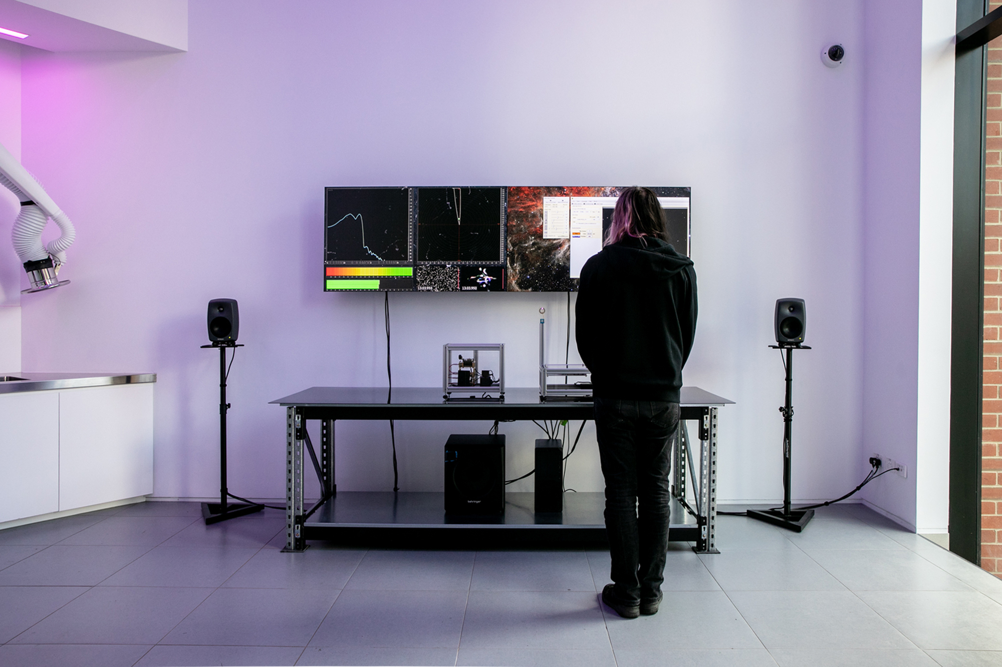 Visitor viewing the μMuography installation at Science Gallery Melbourne