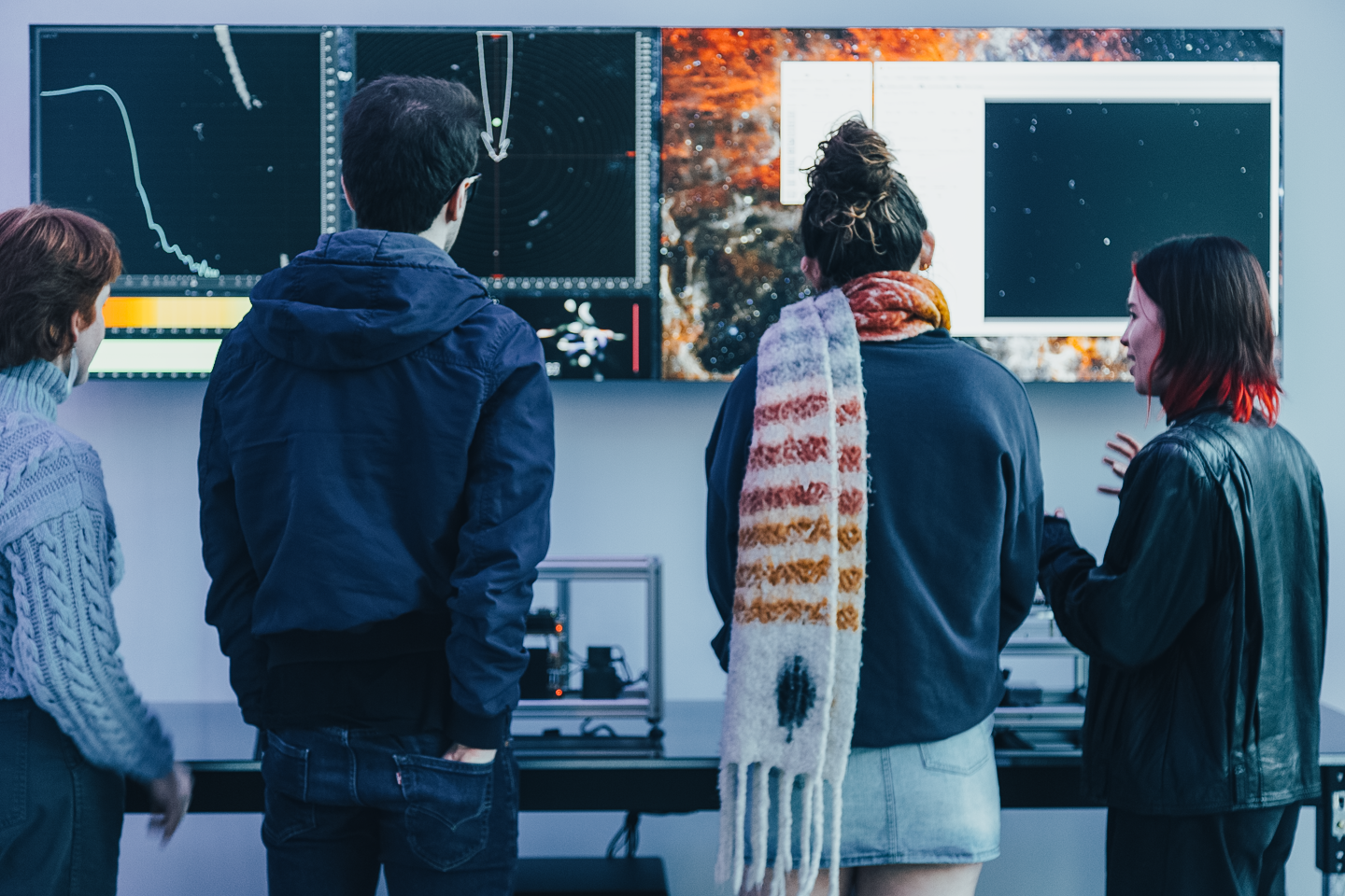 Visitors encountering the μMuography installation