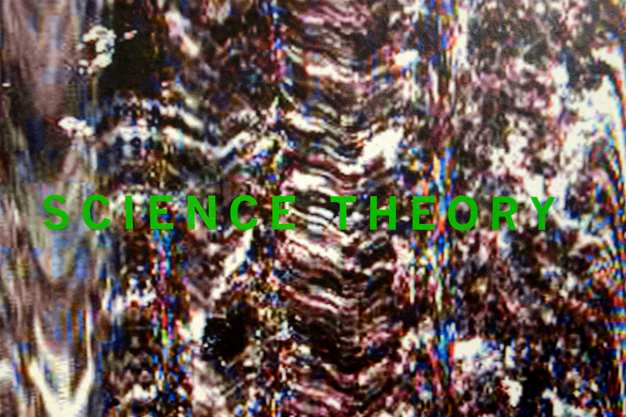 Photographic detail bearing the words Science Theory