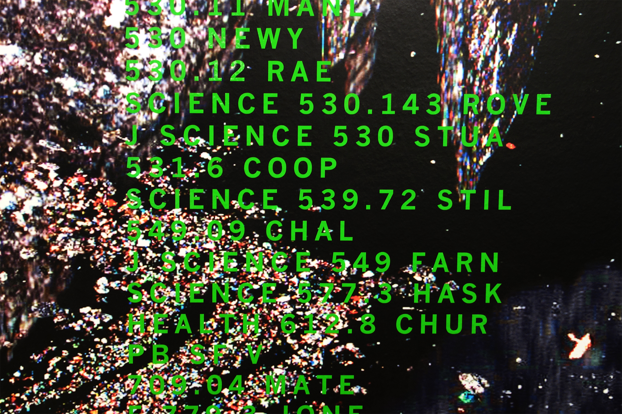 Photographic detail overlaid with green index text