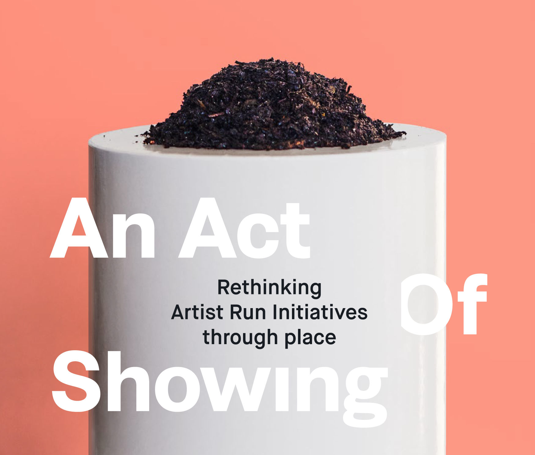An Act of Showing exhibition graphic with a dark material mound on a white plinth